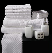 Махровые полотенца белые для гостиниц
